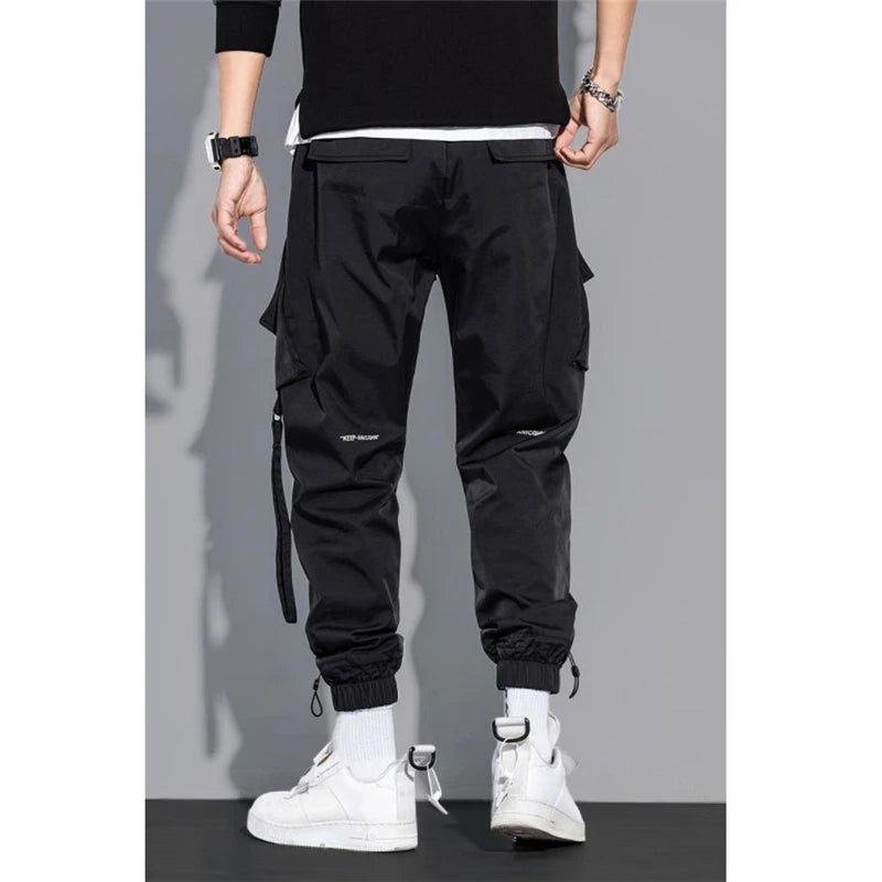 Men’s Streetwear Cargo Jogger Pants – Multi-Pocket Slim Fit Harem Trousers with Ribbons